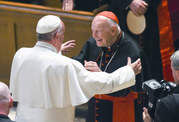 In this 2015 photo, Pope Francis reaches out to hug Cardinal Archbishop emeritus Theodore McCarrick.