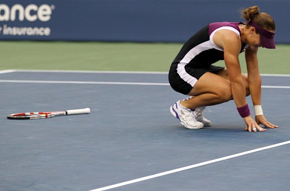 Samantha Stosur of Australia reacts after defeating Serena Williams of the United States to win the US Open.