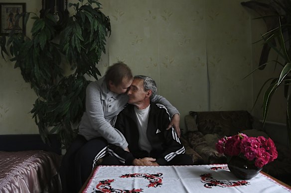 Natalia Popov embraces her husband Boris, a tradesman in their home in Vorzel. Boris was detained by Russian soldiers on March 5 while collecting water and was unlawfully detained, tortured, and witnessed the torture and death of others. After being transferred through Belarus to a Russian prison where he remained for nearly two months, he was released as part of a prisoner exchange. 