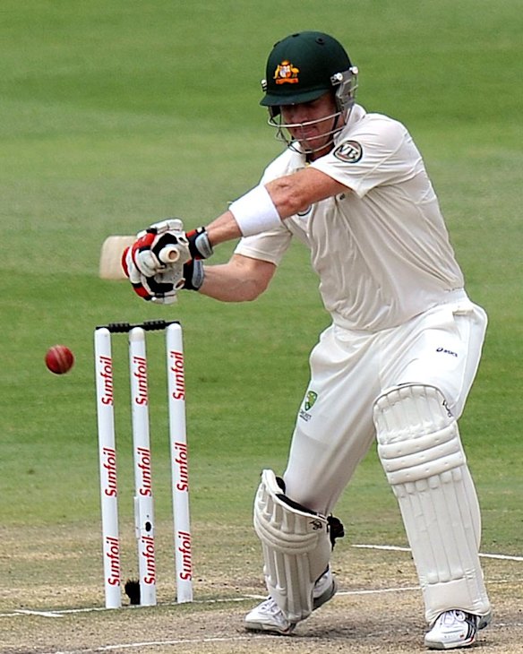 Brad Haddin offers a tentative prod to a ball outside the off-stump.