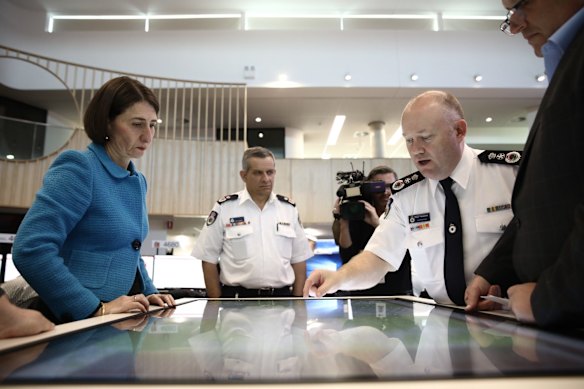 NSW Premier Gladys Berejiklian is briefed at Rural Fire Service Headquarters in Olympic Park, Sydney. September 7, 2019.