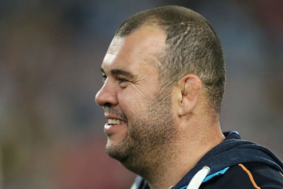 A rare smile: Waratahs coach Michael Cheika beams after the Super Rugby final win over the Crusaders at ANZ Stadium.