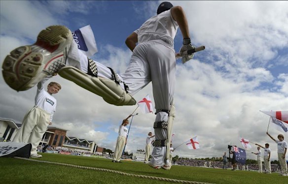 England's captain Alastair Cook runs out to bat before the fourth Ashes test cricket match against Australia at the Riverside in Chester-le-Street near Durham.