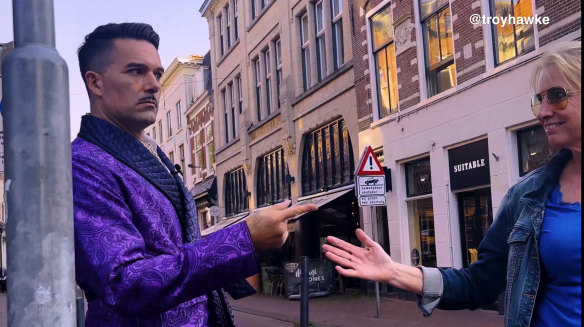 Troy Hawke greets a passer-by.