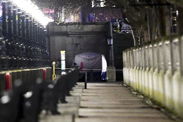 A police forensic tent is erected on a walkway beside Westminster Bridge following a terrorist attack in which a number of pedestrians were mowed down.