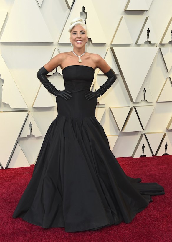 Lady Gaga arrives at the Oscars at the Dolby Theatre in Los Angeles channeling Audrey Hepburn. She is wearing Alexander McQueen and the Tiffany Diamond; only the third woman in history to do so, with the last being Hepburn. 