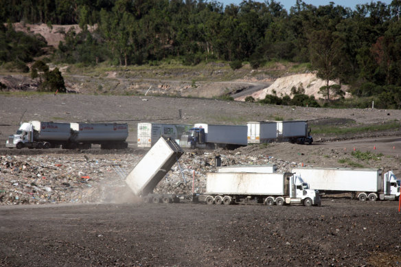 Unprocessed waste from Cleanaway's Willawong recycling facility in south Brisbane is dumped at the company's New Chum landfill in Ipswich.