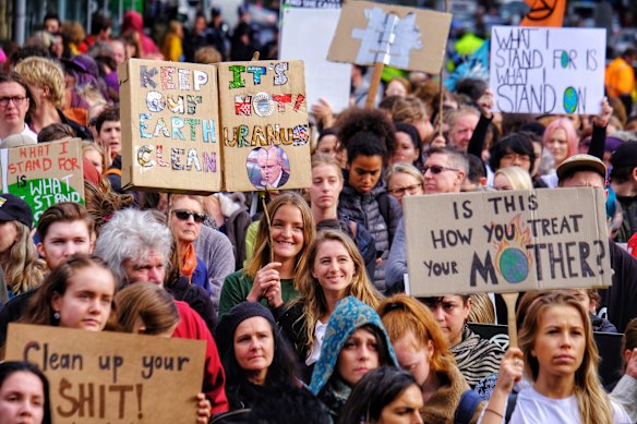 Protesters take part in the Climate Emergency XR Snap Rally in Melbourne.