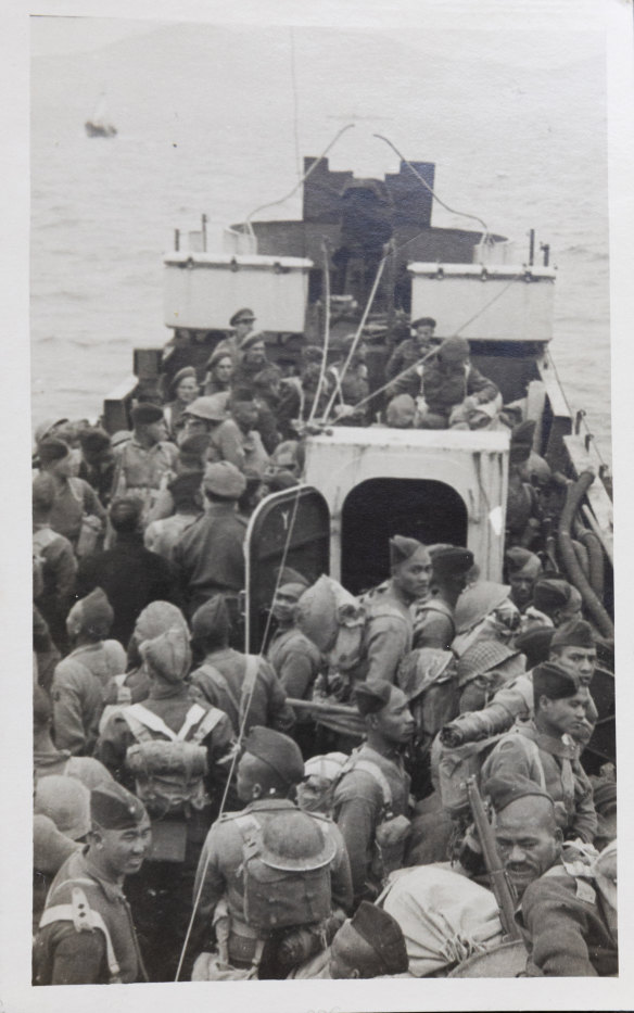 A landing craft loaded with Allied soldiers during World War Two.  