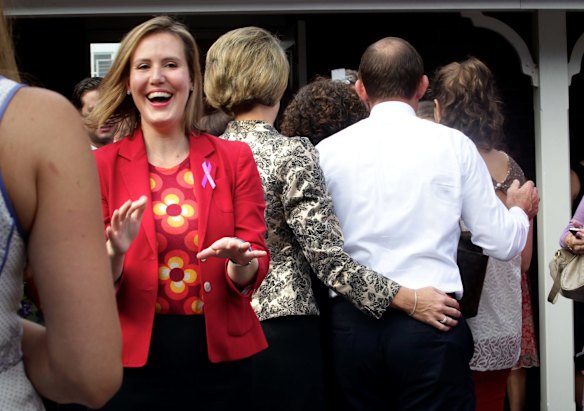 Tony Abbott attends an International Women's Day function in Malvern with Kelly O'Dwyer in 2013.  