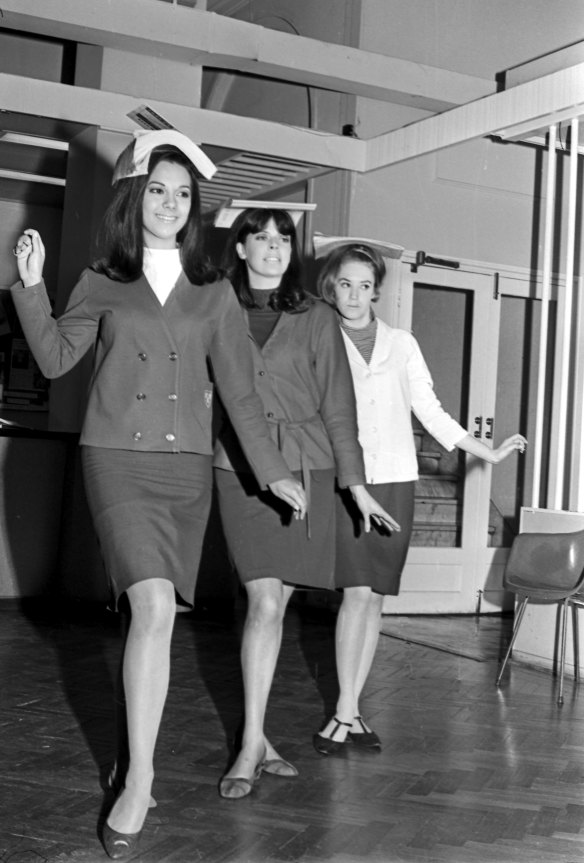 Students at the June Dally-Watkins School of Modelling in Sydney demonstrate how to walk tall.