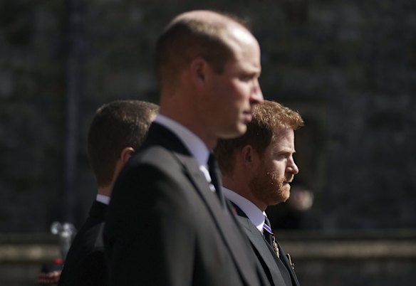 Prince William, the Duke of Cambridge and Prince Harry walk in the procession.