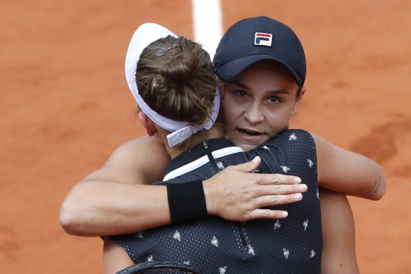 Australia's Ashleigh Barty hugs Marketa Vondrousova.