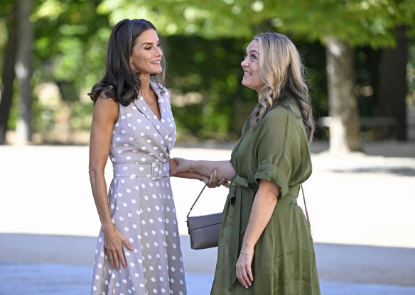 Queen Letizia of Spain greets Jodie Haydon at the Royal Palace of La Granja de San Ildefonso.