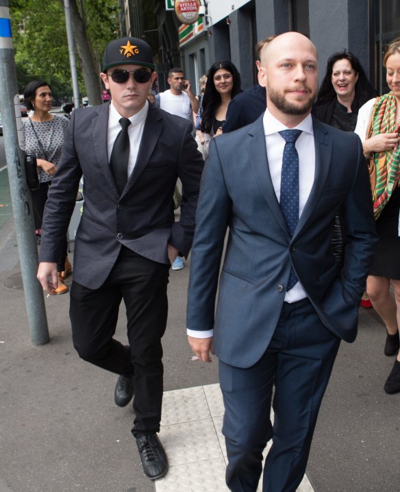 Jamie Williams (right) leaves court accompanied by Brisbane man Ashley Dyball who had fought against Islamic State.