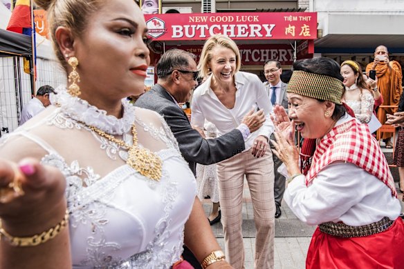 Labor frontbencher Kristina Keneally sought to move from the Senate to the lower house at the federal election, running in the seat of Fowler. Here she dances with members of the Cambodian community at Freedom Plaza in Cabramatta on March 12. She failed to win the seat in May. 