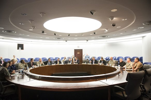 The state of confusion complicates any plans for a response. Is an attack an act of mischief? A protest? An act of war? The answer may require a response from business, military or government, or a combination of the three. Defense Secretary Ash Carter meets Admiral Mike Rogers, head of the National Security Agency (NSA), at NSA headquarters at Fort Meade, Maryland.