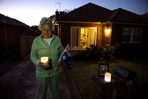 Wendy Crawford standing at her driveway in Beverley Hils to commemorate Anzac Day.
