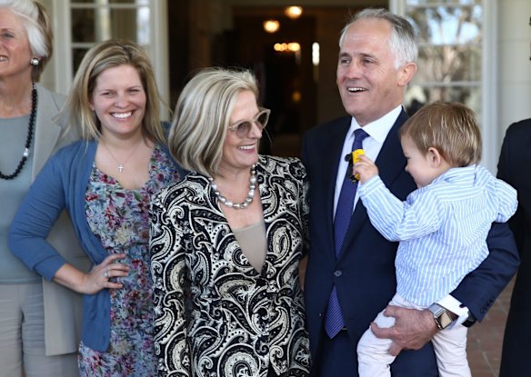 Mr Turnbull at Government House with his daughter Daisy, wife Lucy and grandson Jack.