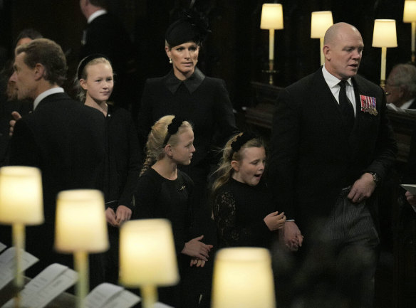 Savannah Phillips and Zara Tindall (back) and Isla Phillips, Lena Tindall and Mike Tindall at the committal service for the Queen.