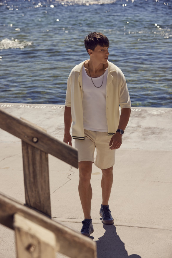 Charlton shirt, $325; Uniqlo tank top, $20; Wynn Hamlyn ivory denim shorts, $245; Longines “Legend” Diver watch, $3625; Spring Court goatskin vintage 
trainers, $170. 