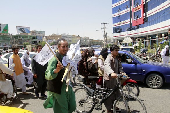 A man sells Taliban flags in Herat province, west of Kabul, Afghanistan.