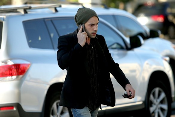 A man arrives at the Avondale Heights home.