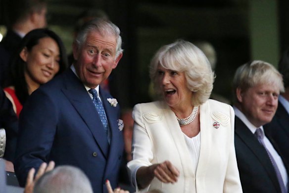 Prince Charles and his wife Camilla, Duchess of Cornwall, arrive for the opening ceremony. Photo by AP