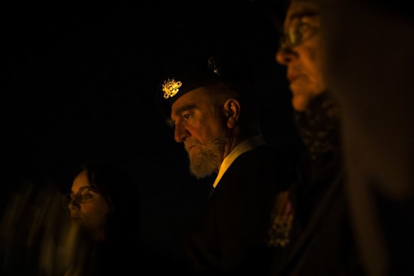 Veterans pay their respects.