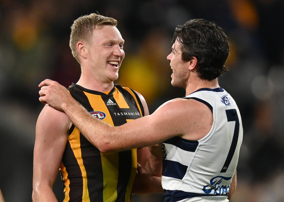 New Hawthorn captain James Sicily with former teammate Isaac Smith.