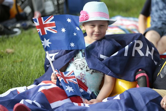 Matilda Abela, 5, of Jerrabomberra with a few Aussie flags.  