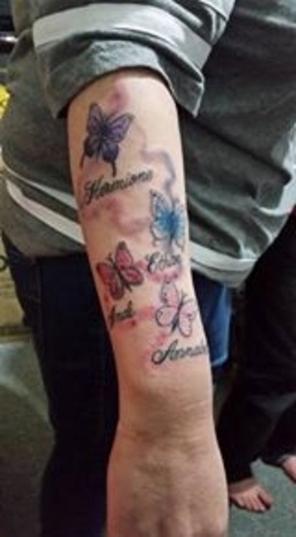 Samantha Kelly had a distinctive tattoo of her four childrens' names on her arm.