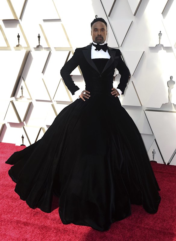 Billy Porter arrives at the Oscars at the Dolby Theatre in Los Angeles. Billy's dress is by Christian Siriano, who won Project Runway season 4.
