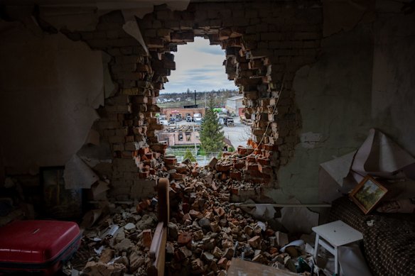 An apartment in Makariv with a hole blown through the wall by Russian tanks during the invasion.