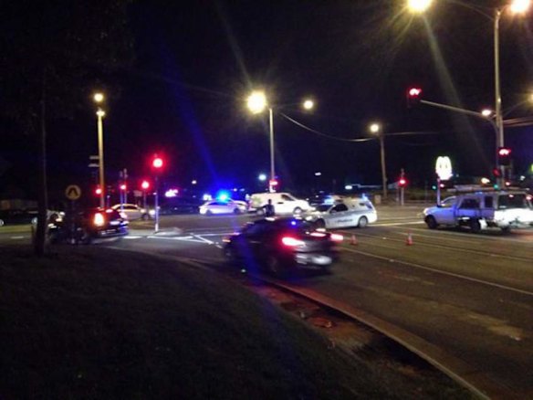 Police set up a road block near the police station.