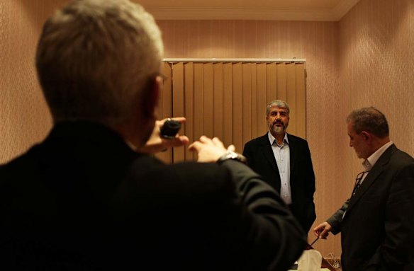 Khalid Mishal (center) with his close friends and advisors during a meeting at a house in Doha, Qatar.