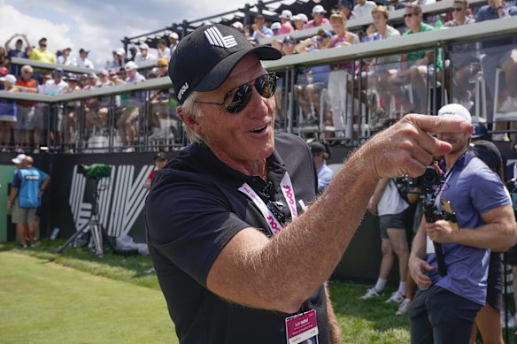 LIV CEO Greg Norman talks with fans at the first tee during the final round of the Bedminster Invitational LIV Golf tournament in July. 