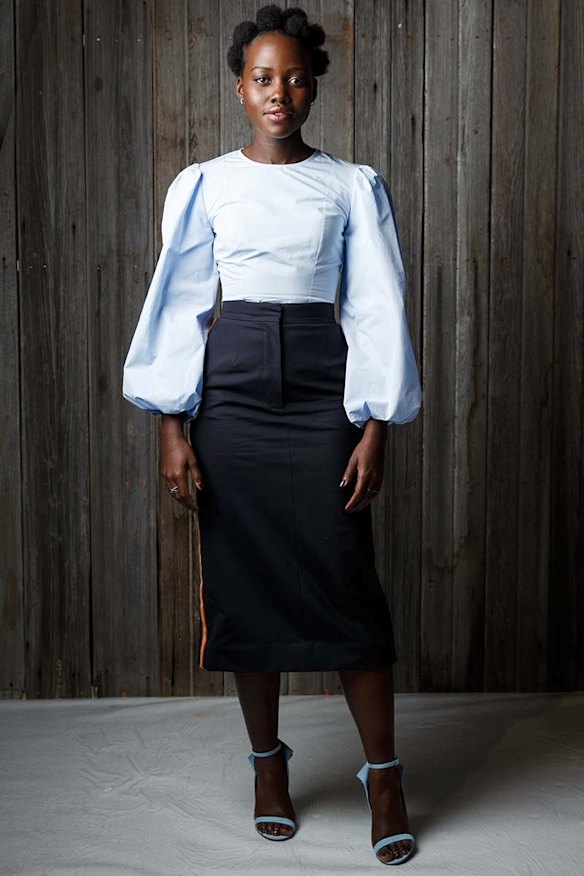 Lupita Nyong'o attends the Calvin Klein showcase.