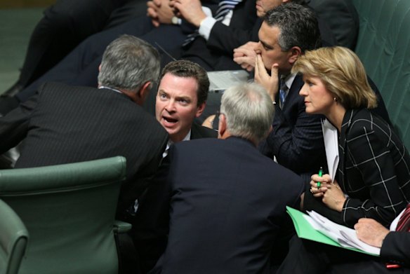 Opposition Leader Malcolm Turnbull talks with his front bench team including Christopher Pyne, Joe Hockey, Juile Bishop and Andrew Robbduring question time on Wednesday 17 September 2008. 