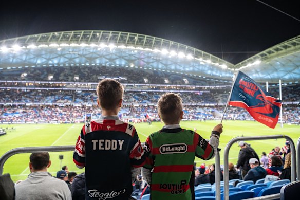 Friends supporting opposing teams.