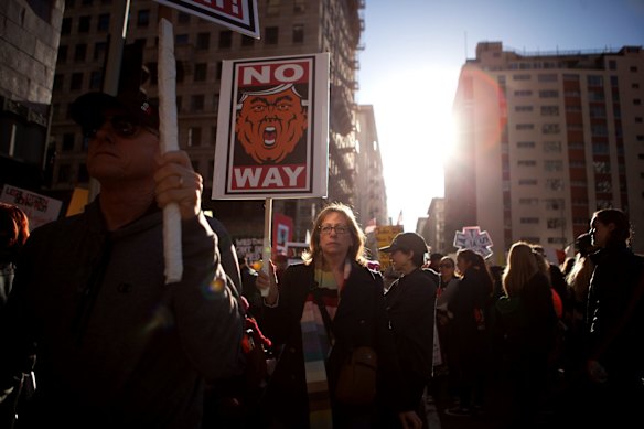 Demonstrators gather at Pershing Square before the start of the Women's March of Los Angeles in Los Angeles, California.