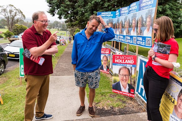 Labor's Bega candidate Dr Michael Holland (left) with outgoing NSW Liberal MP Andrew Constance at the Moruya Public School polling booth. 