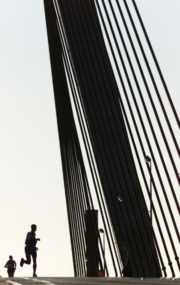 Marathon runners cross the Anzac Bridge.