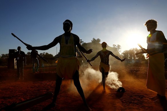 Gumatj clan ceremonial leaders performing the Gurtha ceremony at the opening ceremony of the First Nations National Convention held in Uluru, at the Mutitjulu community.