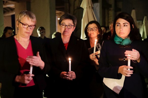 Senator Janet Rice, Senator Penny Wong, Ged Kearney and Terri Butler attend a candlelight vigil for Eurydice Dixon, at Parliament House in Canberra.