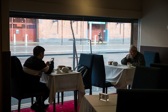 Cafes and restaurants have reopened today with a limit of 10 people. Diners in a restaurant in China Town.