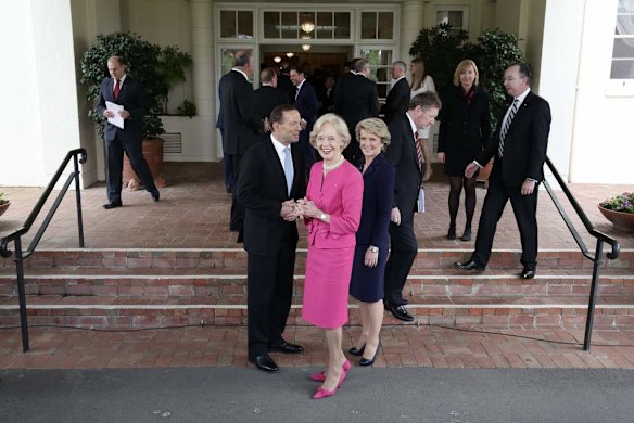 Governor-General Quentin Bryce poses for photos with Prime Minister Tony Abbott and his new ministry at Government House in Canberra.