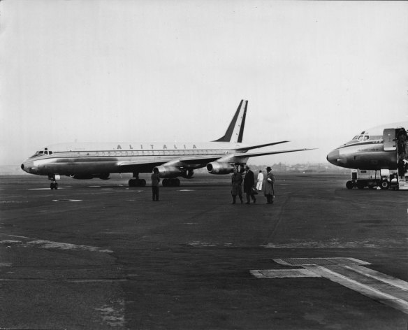 An Alitalia DC 8 landing at Mascot. July 13, 1962