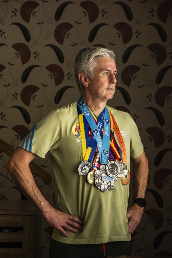 Joseph Moran wears the medals from every major marathon he has completed. He will not get the chance to add one from Sydney this year.