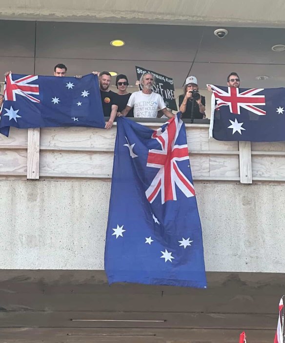 The 52-year-old man at the Brisbane rally was detained but not arrested, allegedly for breaching the peace.